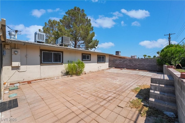 5317 Lytton Ave, Las Vegas, NV 89146 - rear view of house featuring stucco siding and a patio