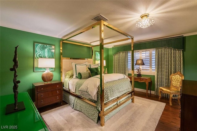 2030 Mohigan Way, Las Vegas, NV 89169 - bedroom with wood finished floors and baseboards