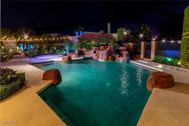 2030 Mohigan Way, Las Vegas, NV 89169 - pool at twilight featuring a patio