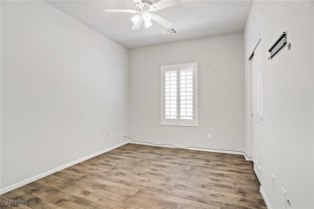 7546 Cooks Meadow St, North Las Vegas, NV 89084 - unfurnished bedroom with wood finished floors, a closet, and a ceiling fan