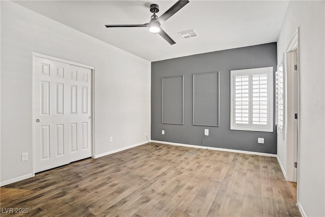 7546 Cooks Meadow St, North Las Vegas, NV 89084 - unfurnished bedroom featuring wood finished floors and ceiling fan