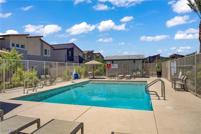 7546 Cooks Meadow St, North Las Vegas, NV 89084 - community pool with a residential view and a patio