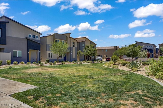 7546 Cooks Meadow St, North Las Vegas, NV 89084 - view of green lawn featuring a residential view