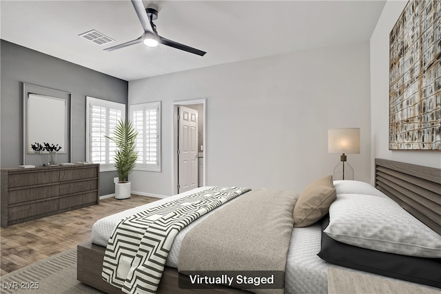 7546 Cooks Meadow St, North Las Vegas, NV 89084 - bedroom featuring wood finished floors and ceiling fan