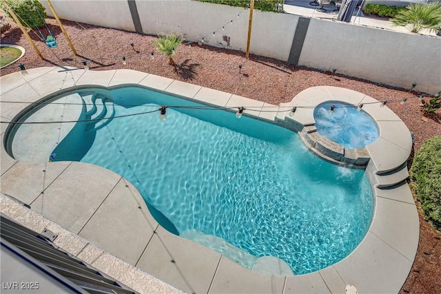229 Wellspring Ave, Las Vegas, NV 89183 - view of swimming pool with a pool with connected hot tub