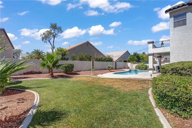 229 Wellspring Ave, Las Vegas, NV 89183 - fenced backyard featuring a balcony and a patio area