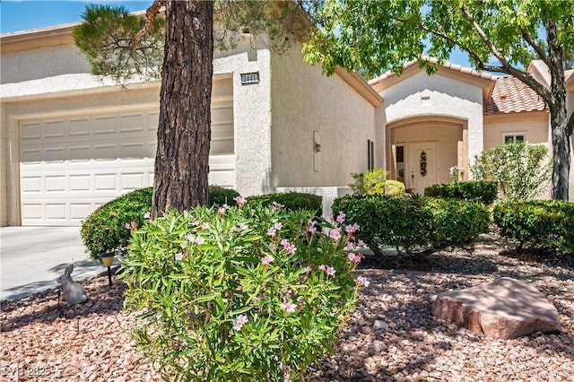 2441 Banora Point Dr, Las Vegas, NV 89134 - view of front of house with stucco siding and a tile roof