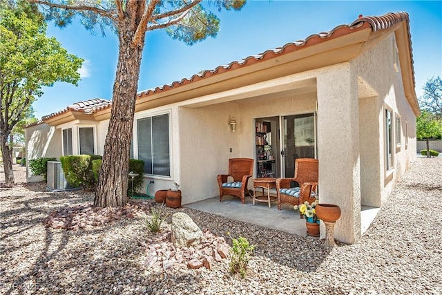 2441 Banora Point Dr, Las Vegas, NV 89134 - view of front of property with stucco siding and a tiled roof