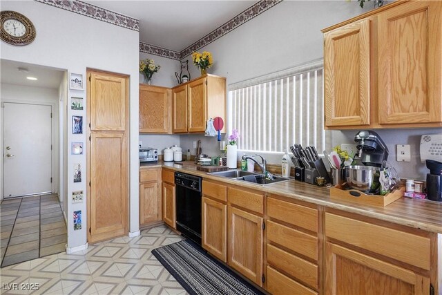 2441 Banora Point Dr, Las Vegas, NV 89134 - kitchen featuring black dishwasher and light countertops