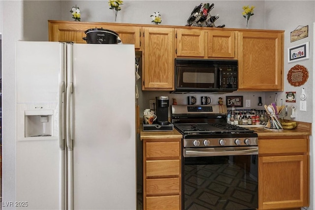 2441 Banora Point Dr, Las Vegas, NV 89134 - kitchen featuring white fridge with ice dispenser, black microwave, and gas stove