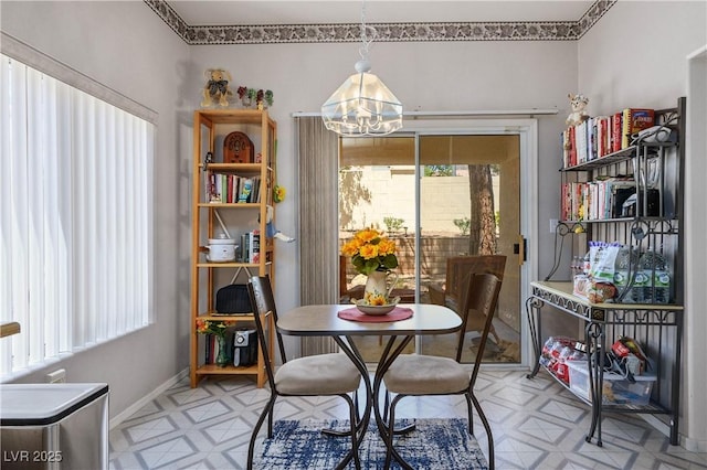 2441 Banora Point Dr, Las Vegas, NV 89134 - dining room featuring light floors and a chandelier