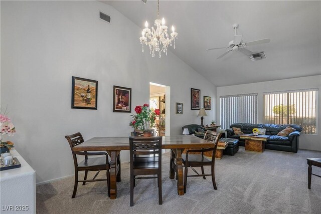 2441 Banora Point Dr, Las Vegas, NV 89134 - dining room with carpet, ceiling fan, high vaulted ceiling, and a chandelier