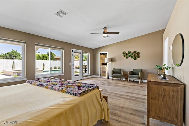 3890 Quadrel St, Las Vegas, NV 89129 - bedroom with access to outside, light wood finished floors, lofted ceiling, and a ceiling fan