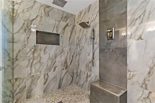 3890 Quadrel St, Las Vegas, NV 89129 - bathroom featuring tiled shower and tile walls