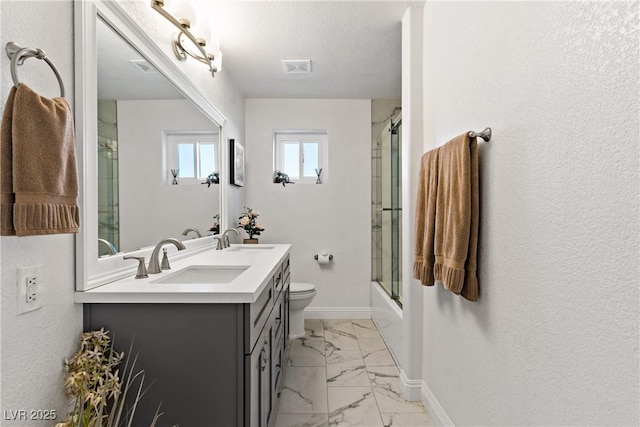 3890 Quadrel St, Las Vegas, NV 89129 - bathroom featuring marble look tiles, double vanity, and bath / shower combo with glass door