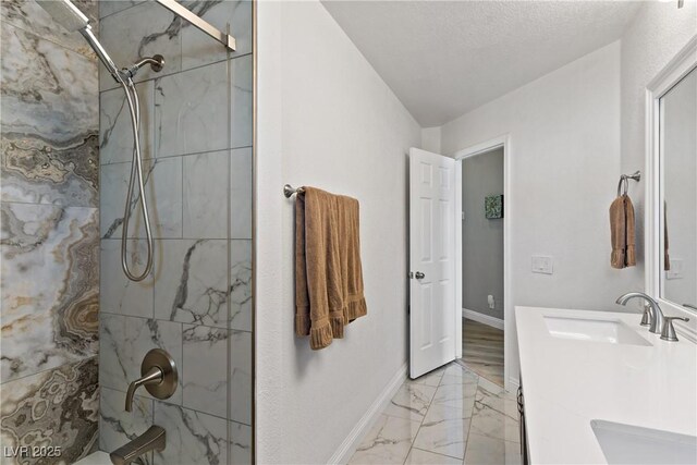 3890 Quadrel St, Las Vegas, NV 89129 - full bath featuring marble look tile flooring, a marble finish shower, and double vanity