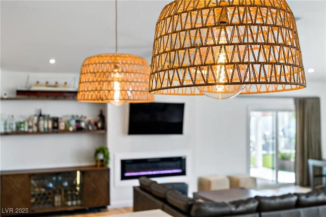 3890 Quadrel St, Las Vegas, NV 89129 - living area featuring a glass covered fireplace and recessed lighting
