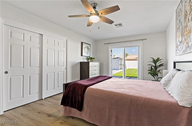 3890 Quadrel St, Las Vegas, NV 89129 - bedroom with access to outside, light wood-type flooring, a ceiling fan, and a closet