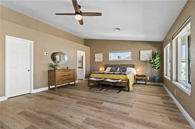 3890 Quadrel St, Las Vegas, NV 89129 - bedroom with lofted ceiling, light wood-style floors, ceiling fan, and ensuite bath