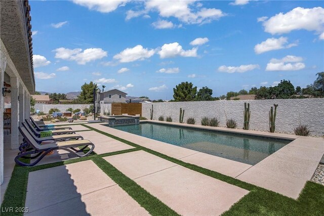 3890 Quadrel St, Las Vegas, NV 89129 - view of swimming pool featuring a patio area, a fenced backyard, and a pool with connected hot tub