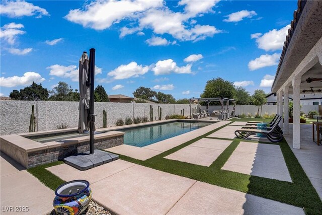 3890 Quadrel St, Las Vegas, NV 89129 - view of swimming pool featuring an in-ground hot tub, a patio area, a fenced backyard, and a pergola