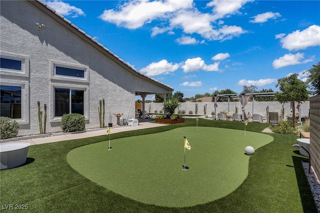 3890 Quadrel St, Las Vegas, NV 89129 - view of home's community with a putting area and a patio area
