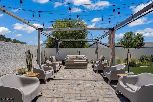 3890 Quadrel St, Las Vegas, NV 89129 - fenced backyard featuring outdoor lounge area and a patio