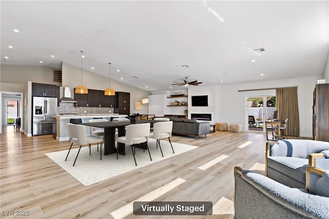 3890 Quadrel St, Las Vegas, NV 89129 - dining space with vaulted ceiling, light wood-type flooring, recessed lighting, and a ceiling fan