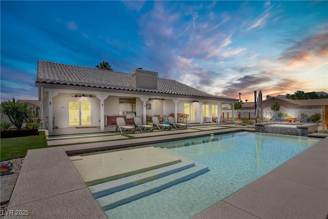 3890 Quadrel St, Las Vegas, NV 89129 - view of pool with ceiling fan, a patio area, and a pool with connected hot tub