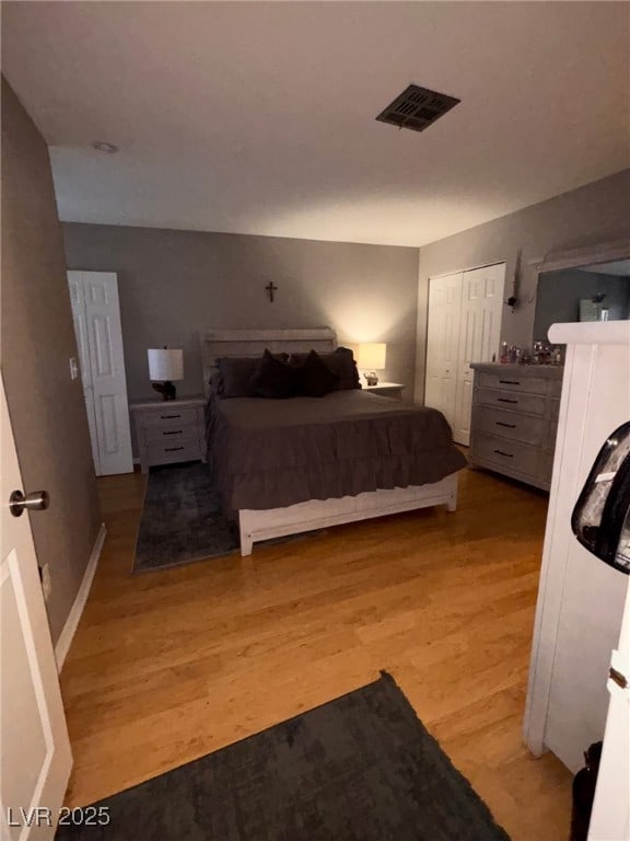1600 N Torrey Pines Dr Unit 101, Las Vegas, NV 89108 - bedroom featuring light wood-style flooring and a closet