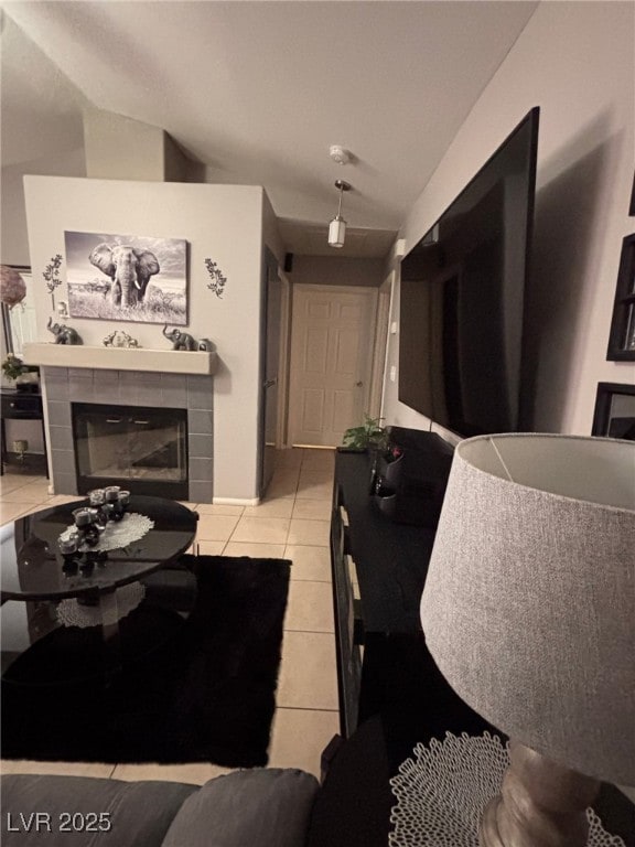 1600 N Torrey Pines Dr Unit 101, Las Vegas, NV 89108 - living room featuring light tile patterned flooring and a fireplace