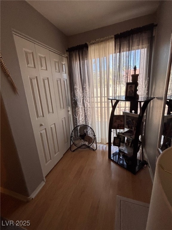 1600 N Torrey Pines Dr Unit 101, Las Vegas, NV 89108 - living area featuring light wood-style floors and baseboards