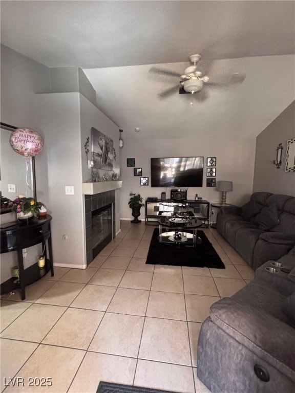1600 N Torrey Pines Dr Unit 101, Las Vegas, NV 89108 - living room with ceiling fan, light tile patterned flooring, and a fireplace