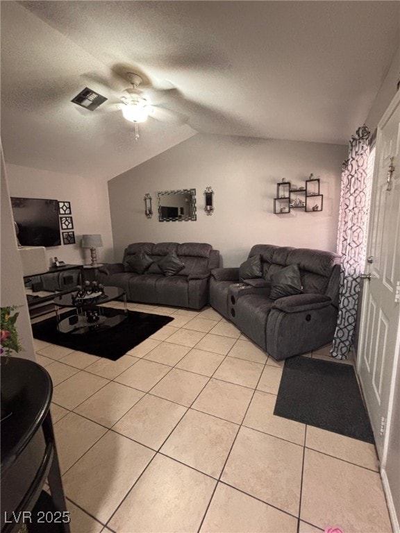 1600 N Torrey Pines Dr Unit 101, Las Vegas, NV 89108 - living room featuring a ceiling fan, lofted ceiling, and light tile patterned floors