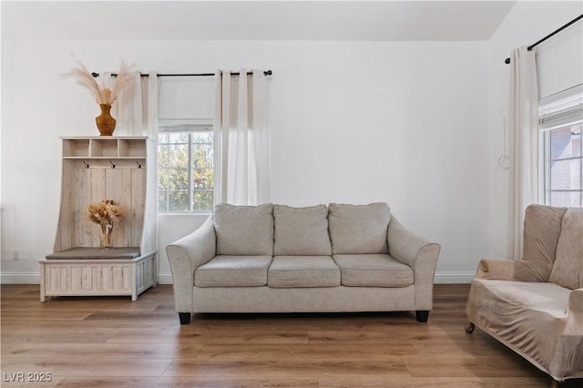 4305 Threshold Ct, North Las Vegas, NV 89032 - living area featuring wood finished floors and healthy amount of natural light