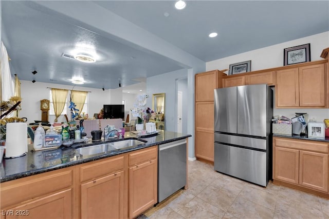 4650 Ranch House Rd Unit 64, North Las Vegas, NV 89031 - kitchen with stainless steel appliances, dark stone counters, light tile patterned floors, and open floor plan