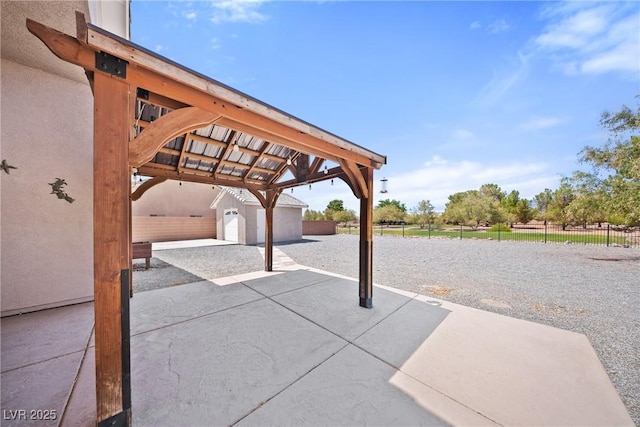 5210 E Chasemoor St, Pahrump, NV 89061 - view of patio / terrace with an outbuilding