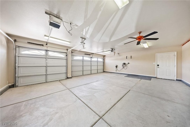 5210 E Chasemoor St, Pahrump, NV 89061 - garage featuring a garage door opener and a ceiling fan