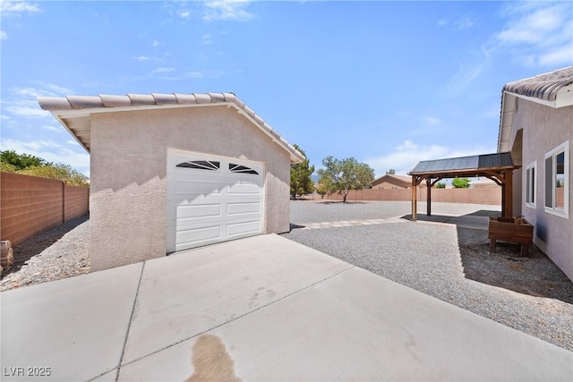 5210 E Chasemoor St, Pahrump, NV 89061 - detached garage featuring concrete driveway
