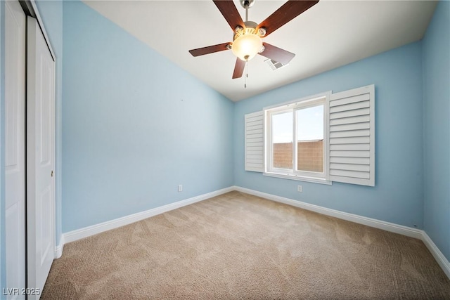 5210 E Chasemoor St, Pahrump, NV 89061 - carpeted spare room featuring baseboards and a ceiling fan