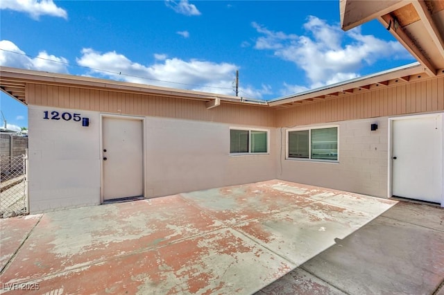 1205 Phillips Ave, Las Vegas, NV 89104 - entrance to property with a patio and concrete block siding