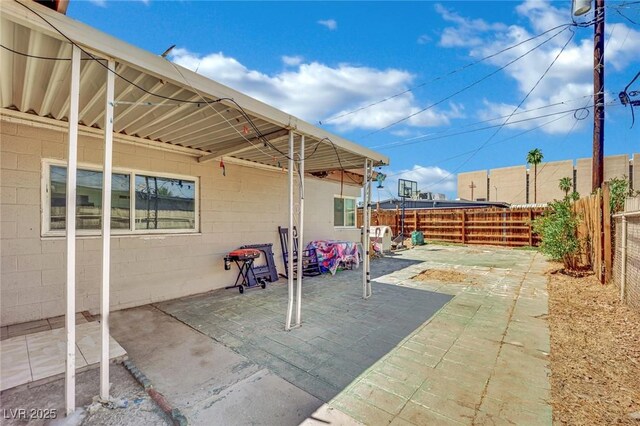 1205 Phillips Ave, Las Vegas, NV 89104 - fenced backyard with a patio area