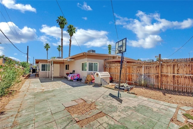 1205 Phillips Ave, Las Vegas, NV 89104 - rear view of house featuring a patio area and a fenced backyard