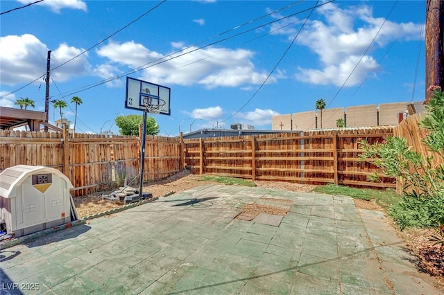 1205 Phillips Ave, Las Vegas, NV 89104 - fenced backyard with a patio area