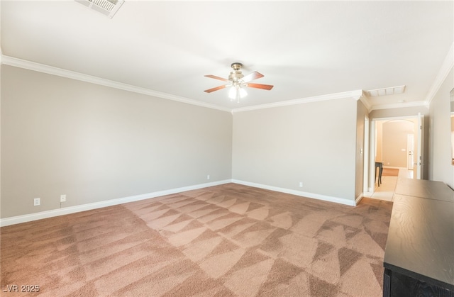 1442 Big Tree Ave, North Las Vegas, NV 89031 - spare room featuring a ceiling fan, ornamental molding, light carpet, and arched walkways