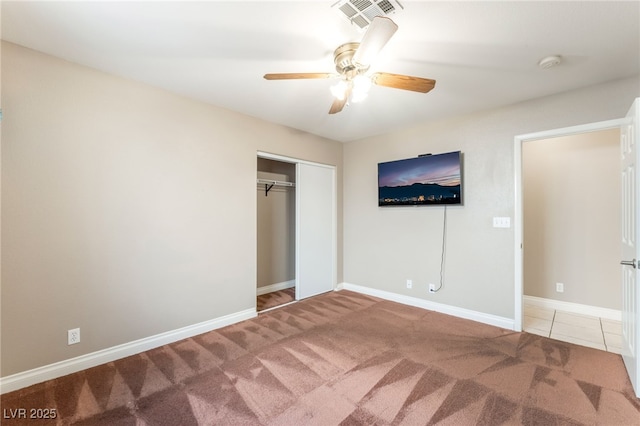 1442 Big Tree Ave, North Las Vegas, NV 89031 - unfurnished bedroom with carpet flooring, a closet, and ceiling fan
