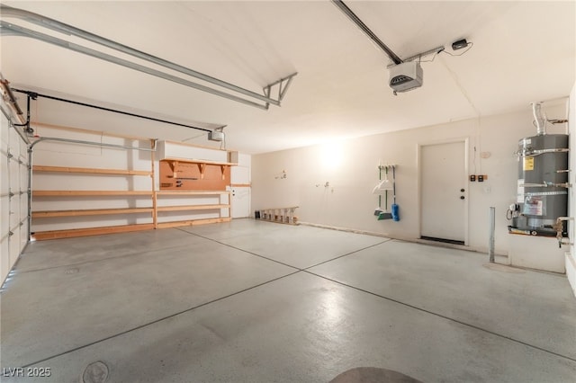 1442 Big Tree Ave, North Las Vegas, NV 89031 - garage with strapped water heater and a garage door opener