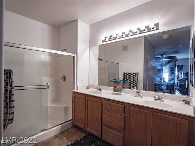 50 Aura De Blanco St Unit 13202, Henderson, NV 89074 - full bathroom featuring a shower stall and double vanity