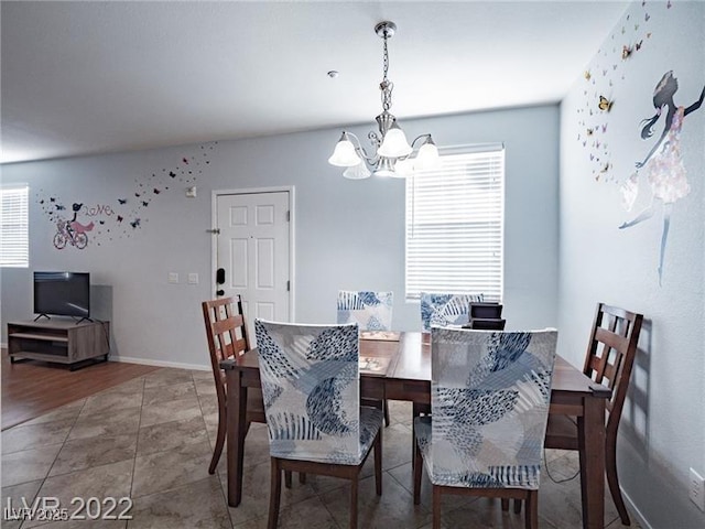 50 Aura De Blanco St Unit 13202, Henderson, NV 89074 - dining room featuring a chandelier and plenty of natural light