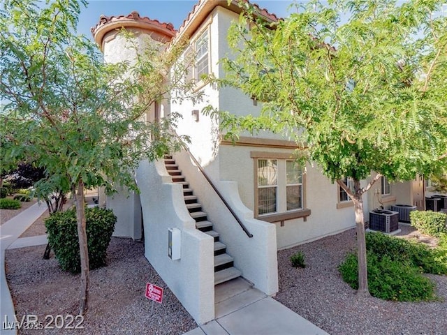 50 Aura De Blanco St Unit 13202, Henderson, NV 89074 - view of front of home with stairs and stucco siding